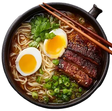 A rich ramen bowl with soft boiled eggs, glazed pork, scallions, and chopsticks